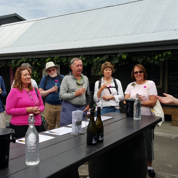 a group of people standing in front of a building