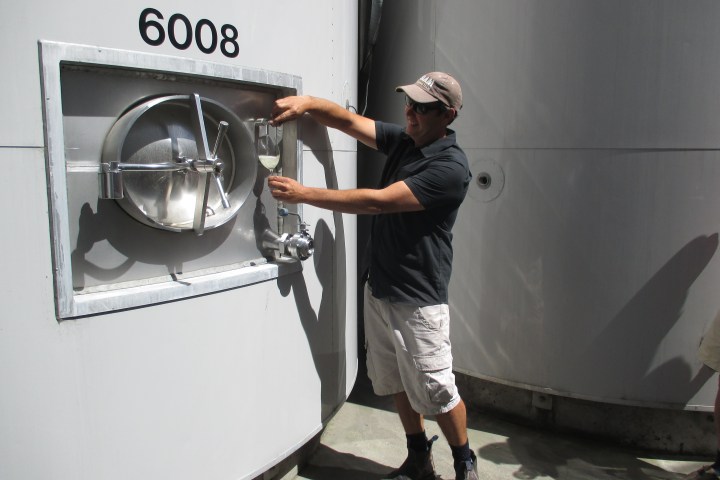 a man riding on the back of a truck