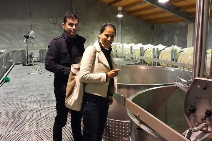 a man standing next to a train