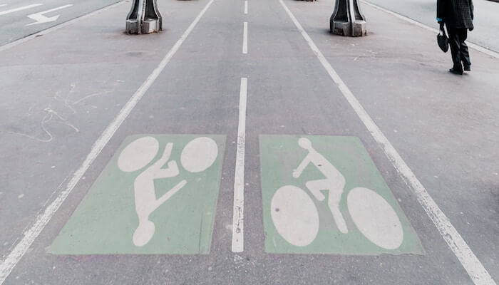 grillot-edouard-682973-unsplash-1 a sign on the side of a road