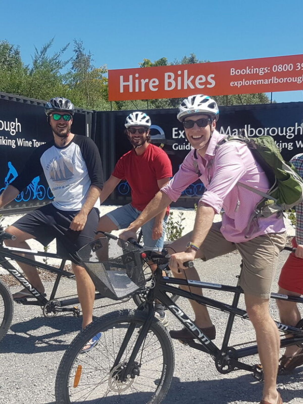 a man riding on the back of a bicycle