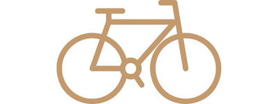 Simple line drawing of a bicycle in gold color.